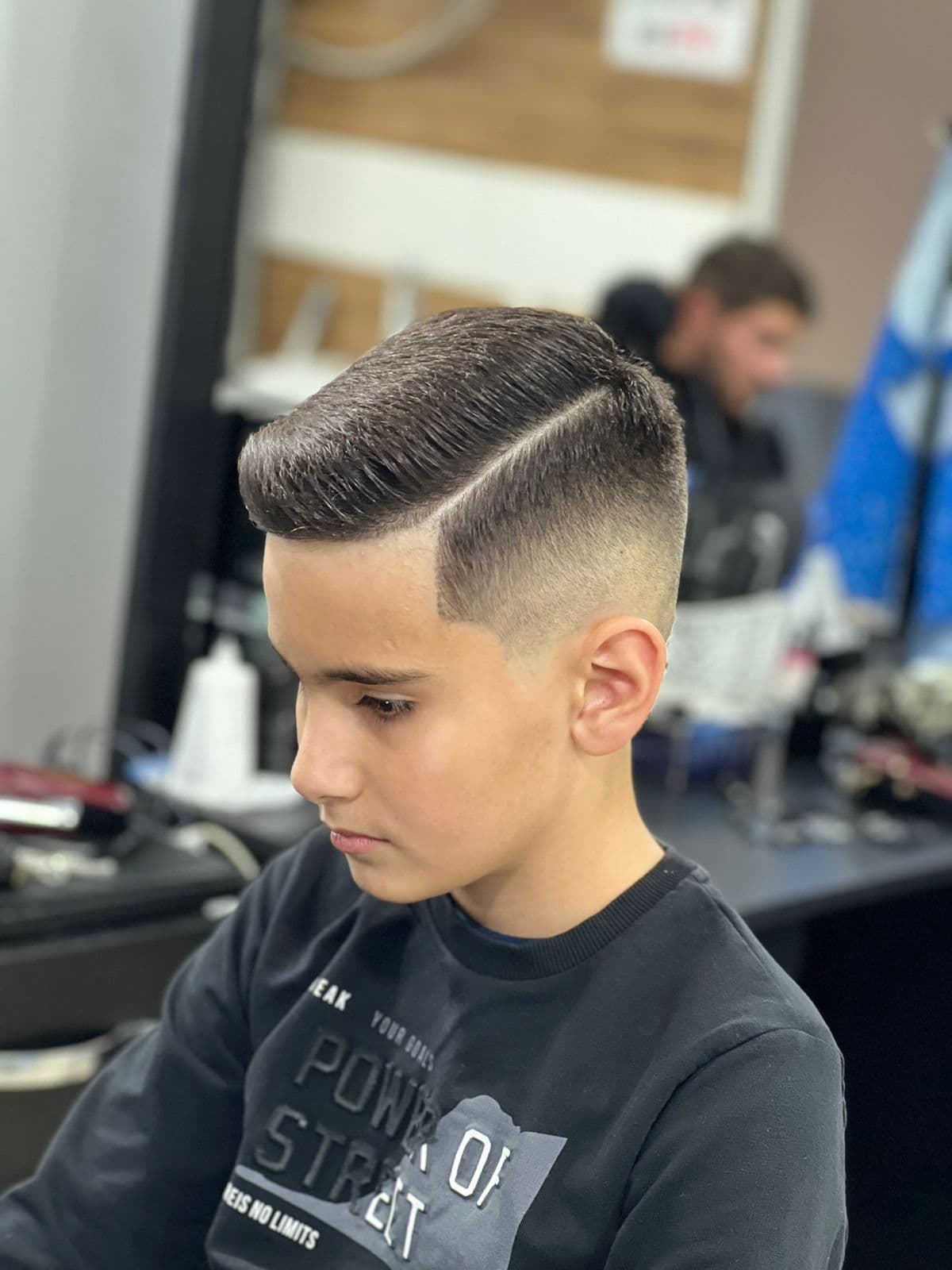 Classic business haircut with professional styling - Professional barbering work by Isaiah Barber