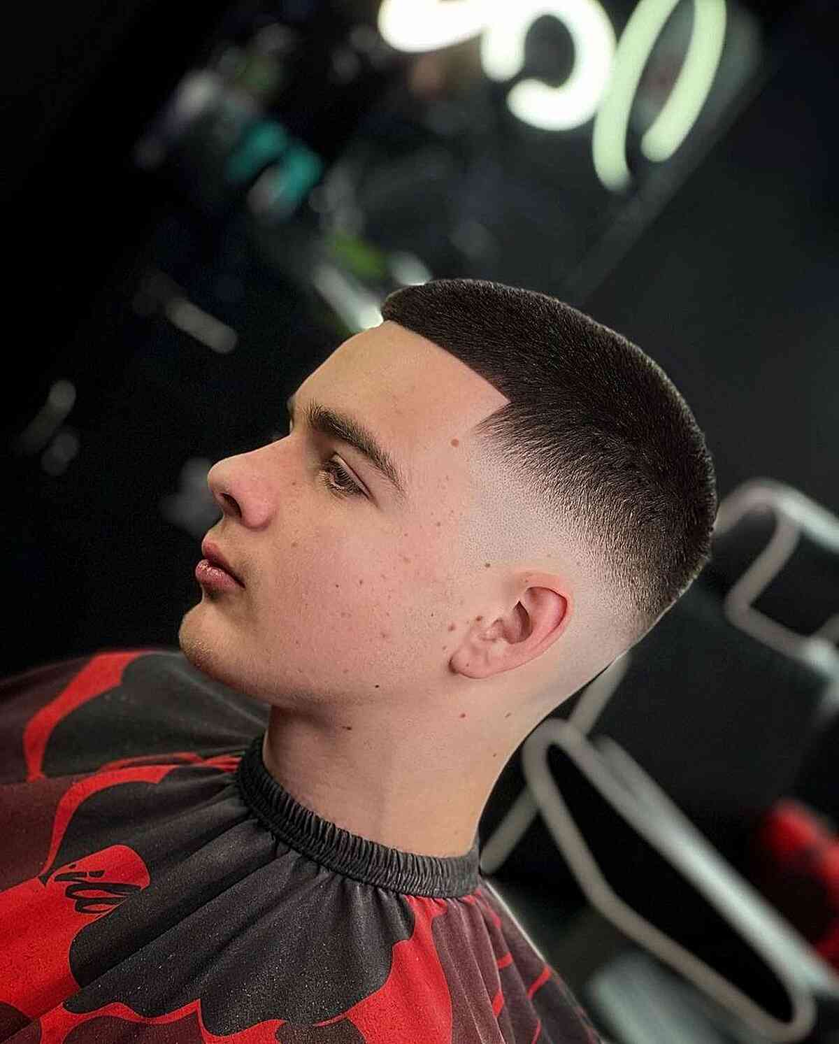 Modern textured cut with contemporary styling - Professional barbering work by Isaiah Barber