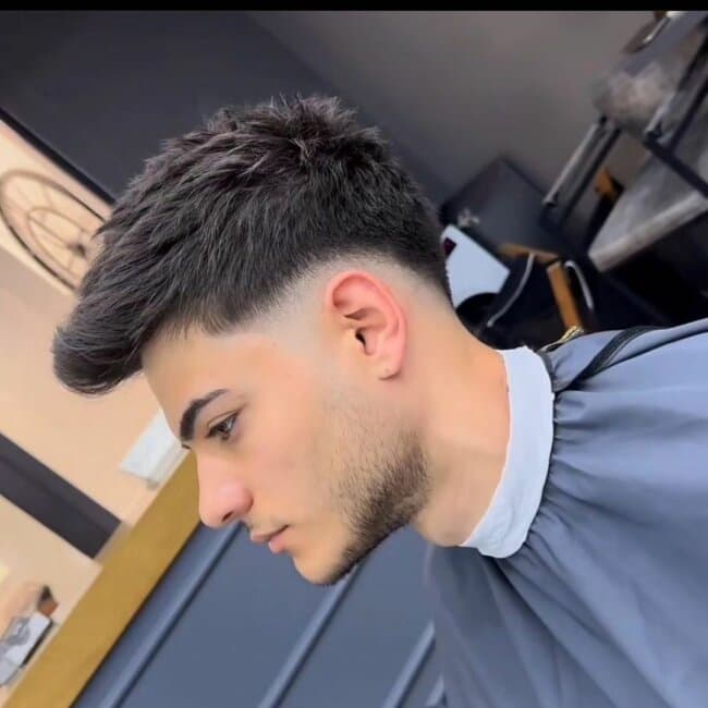 Sharp precision cut with detailed finishing - Professional barbering work by Isaiah Barber