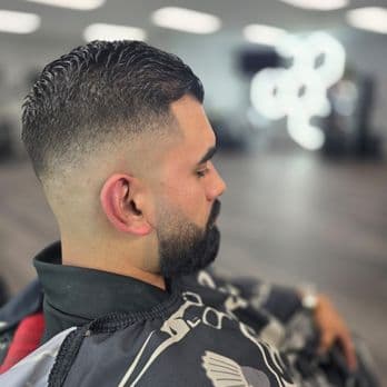 Expert side fade with seamless transition - Professional barbering work by Isaiah Barber