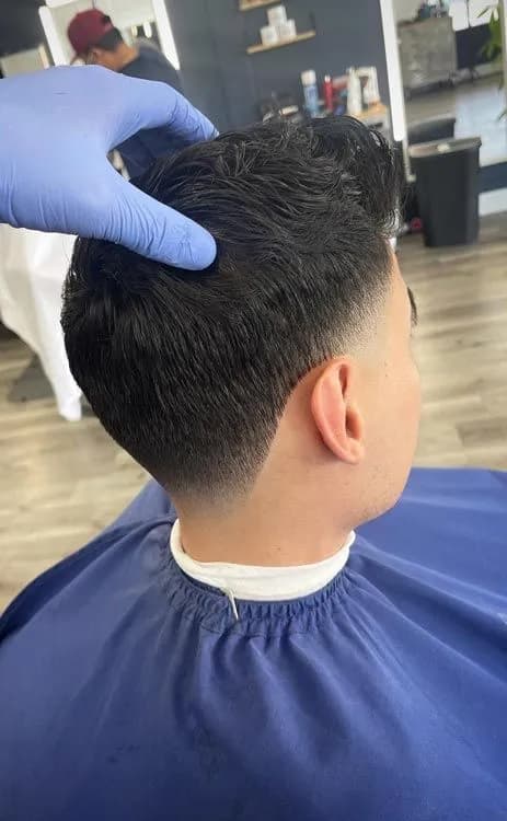 Classic Haircut service at Isaiah Barber - Precision cuts tailored to your face shape and lifestyle. Includes consultation, cut, style, and finishing touches with premium products.